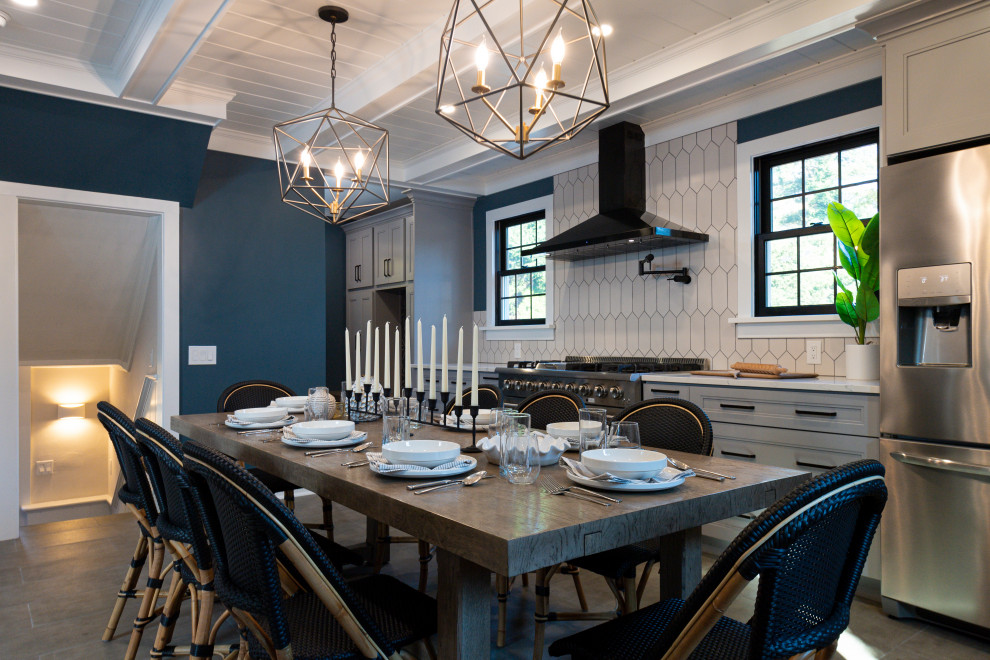 Example of a large transitional l-shaped gray floor and exposed beam eat-in kitchen design in Philadelphia with a farmhouse sink, white cabinets, white backsplash, white countertops, shaker cabinets, quartz countertops and ceramic backsplash