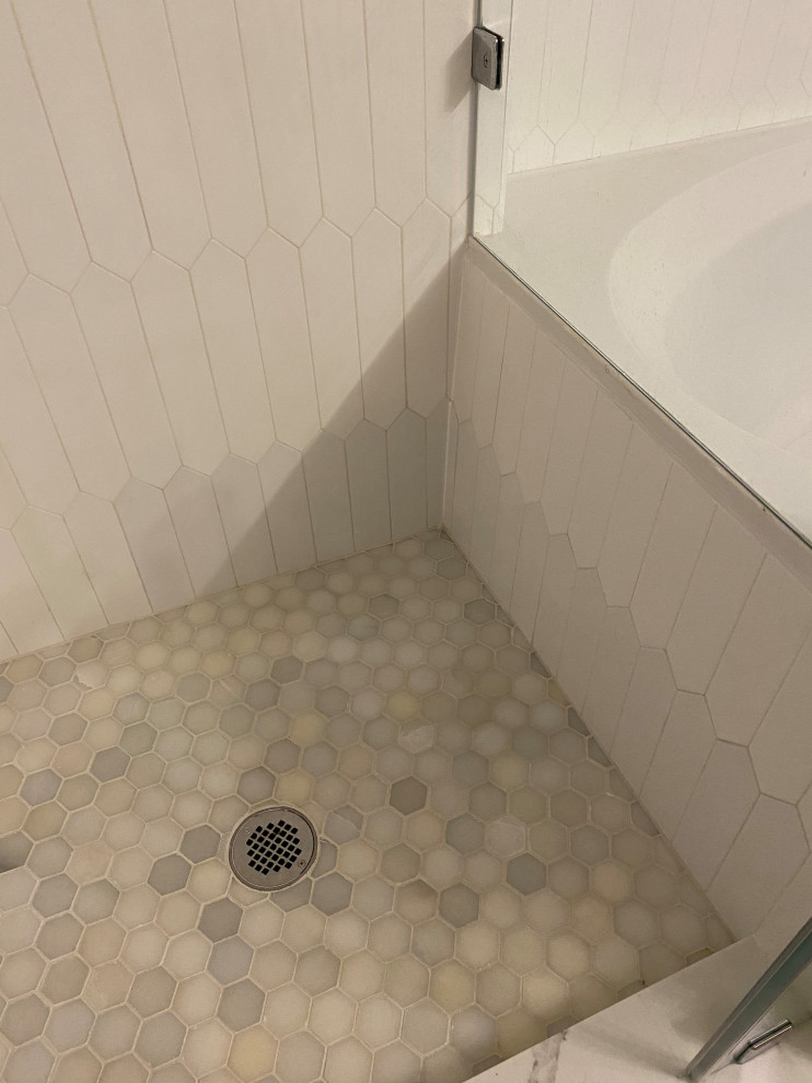 Bottom row of ceramic tiles turning gray?