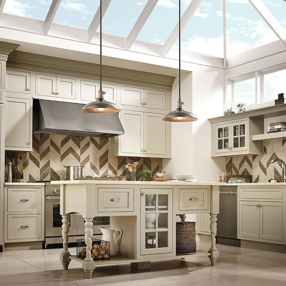 Inspiration for a small arts and crafts kitchen in Other with an integrated sink, recessed-panel cabinets, beige cabinets, soapstone benchtops, brown splashback, ceramic splashback, coloured appliances, ceramic floors and with island.