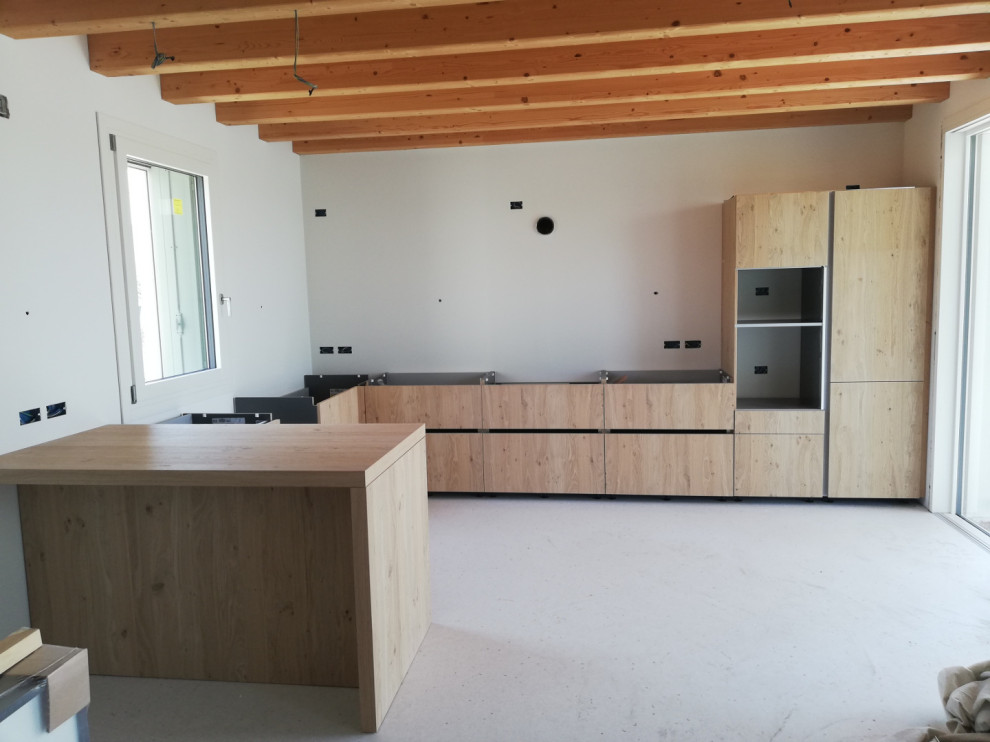Photo of an expansive contemporary l-shaped eat-in kitchen in Other with an undermount sink, flat-panel cabinets, light wood cabinets, quartz benchtops, white splashback, engineered quartz splashback, stainless steel appliances, terrazzo floors, a peninsula, beige floor, white benchtop and exposed beam.