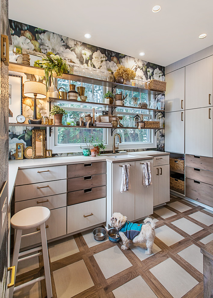 Example of a mid-sized transitional u-shaped enclosed kitchen design in Detroit with an undermount sink, flat-panel cabinets, beige cabinets, no island and beige countertops