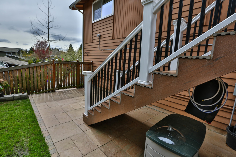 Deck - rustic deck idea in Seattle