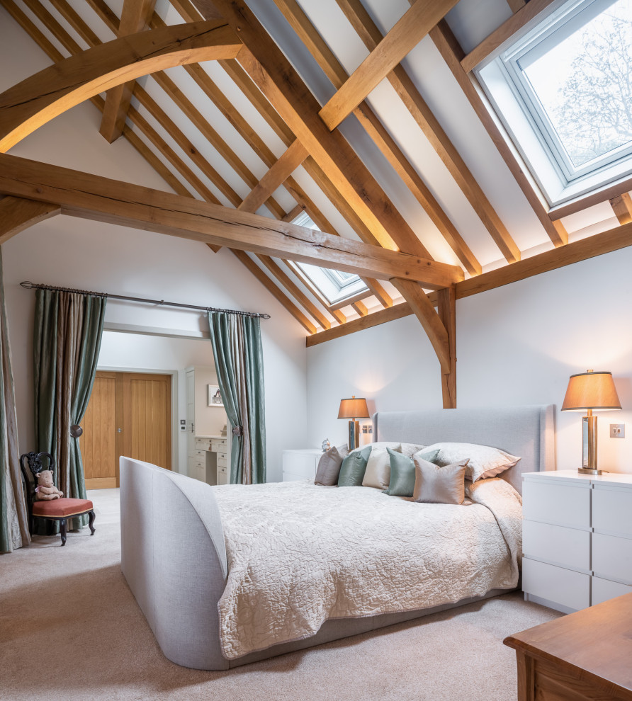 Inspiration for a country bedroom in Other with white walls, carpet, beige floor, exposed beam and vaulted.
