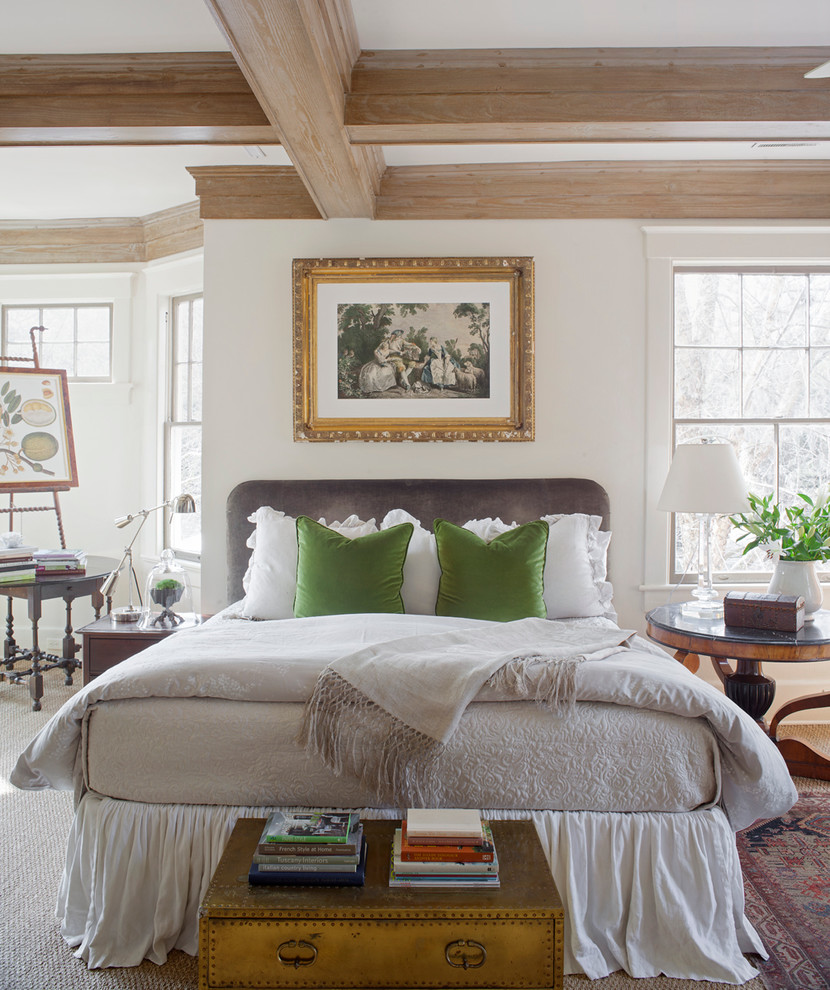 Inspiration for a traditional bedroom in Atlanta with white walls and carpet.