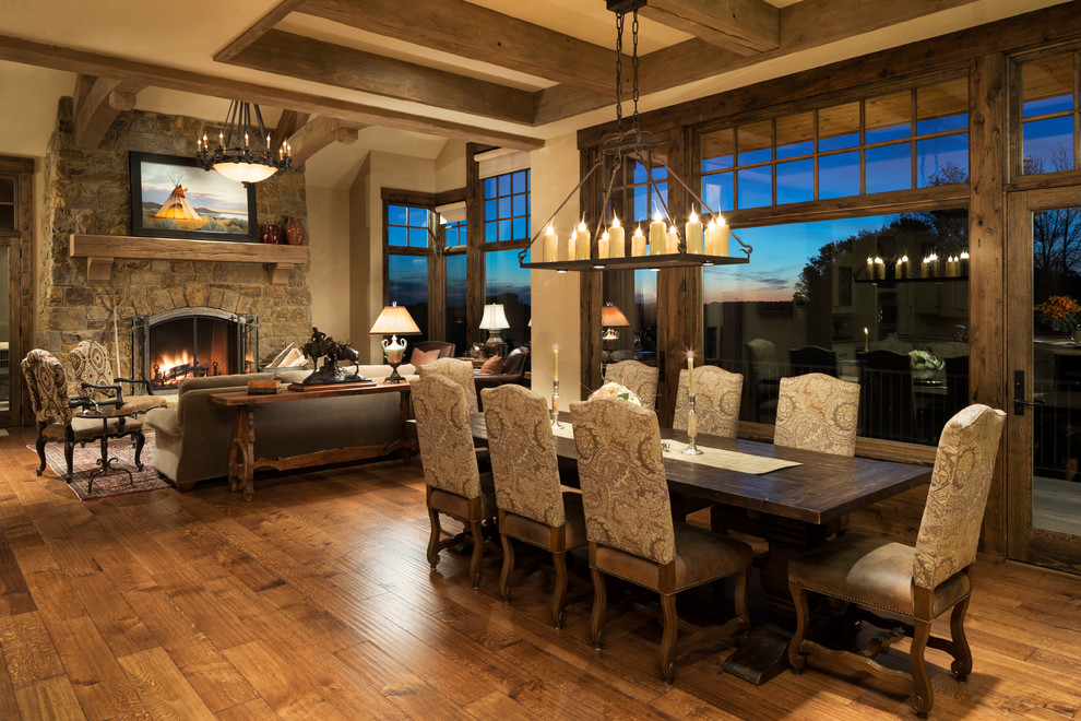 Expansive country open plan dining in Minneapolis with beige walls and medium hardwood floors.