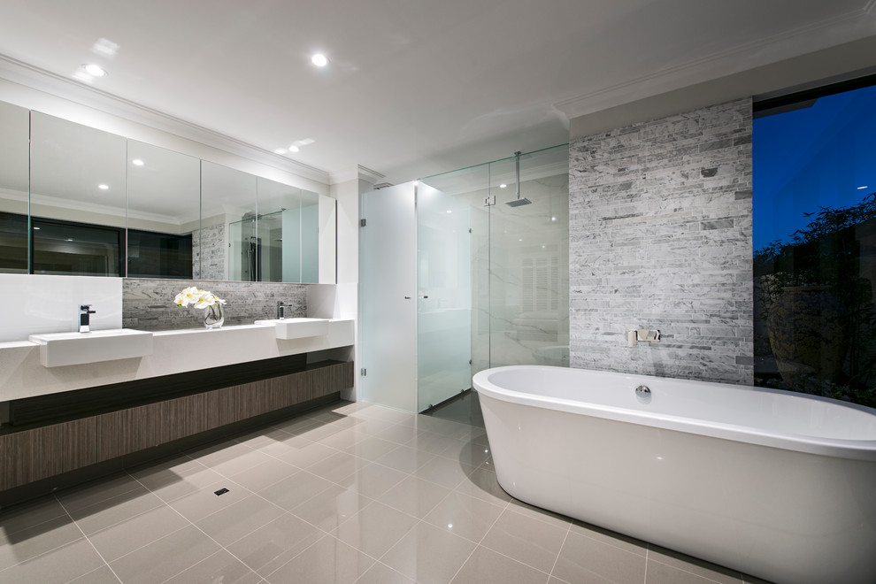 Contemporary master bathroom in Perth with open cabinets, dark wood cabinets, a freestanding tub, an alcove shower, a drop-in sink, grey floor, a hinged shower door and white benchtops.