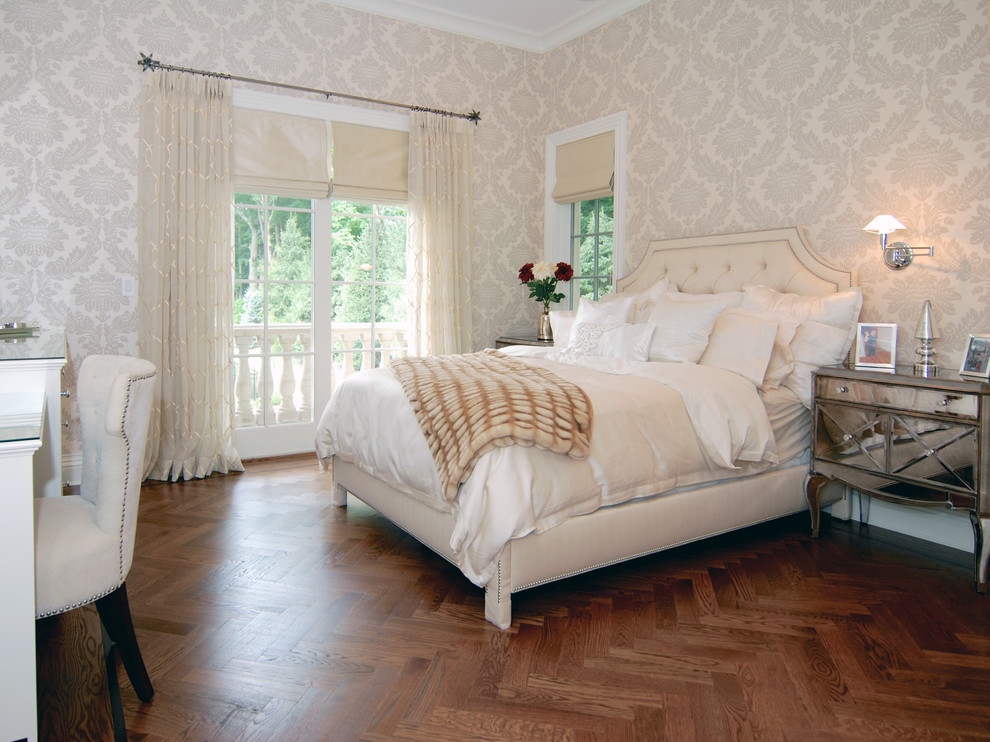 This is an example of a large traditional master bedroom in New York with medium hardwood floors, brown floor and beige walls.