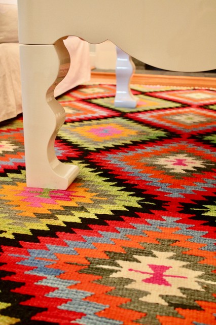 Inspiration for a country medium tone wood floor living room remodel in Other