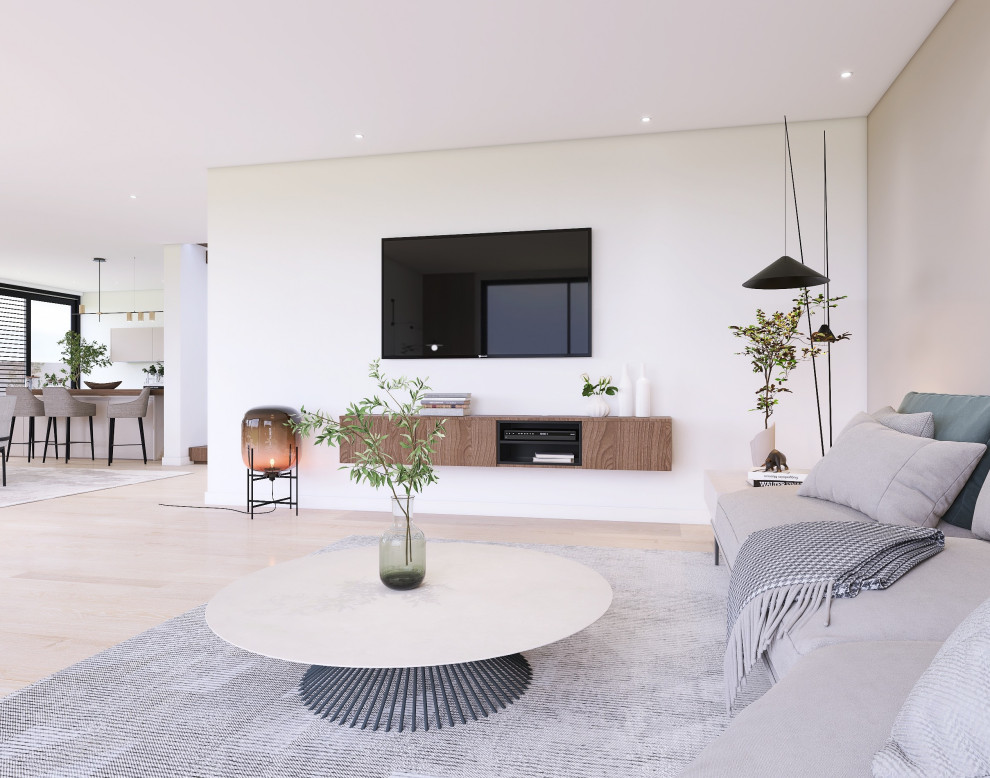 Foto di un grande soggiorno minimalista con pareti beige e parquet chiaro