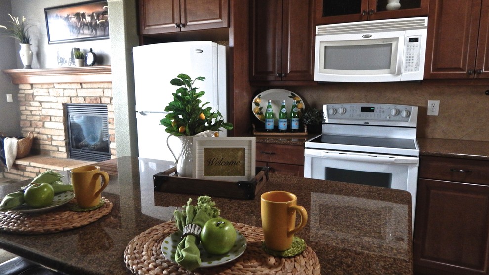 Example of a transitional kitchen design in Denver