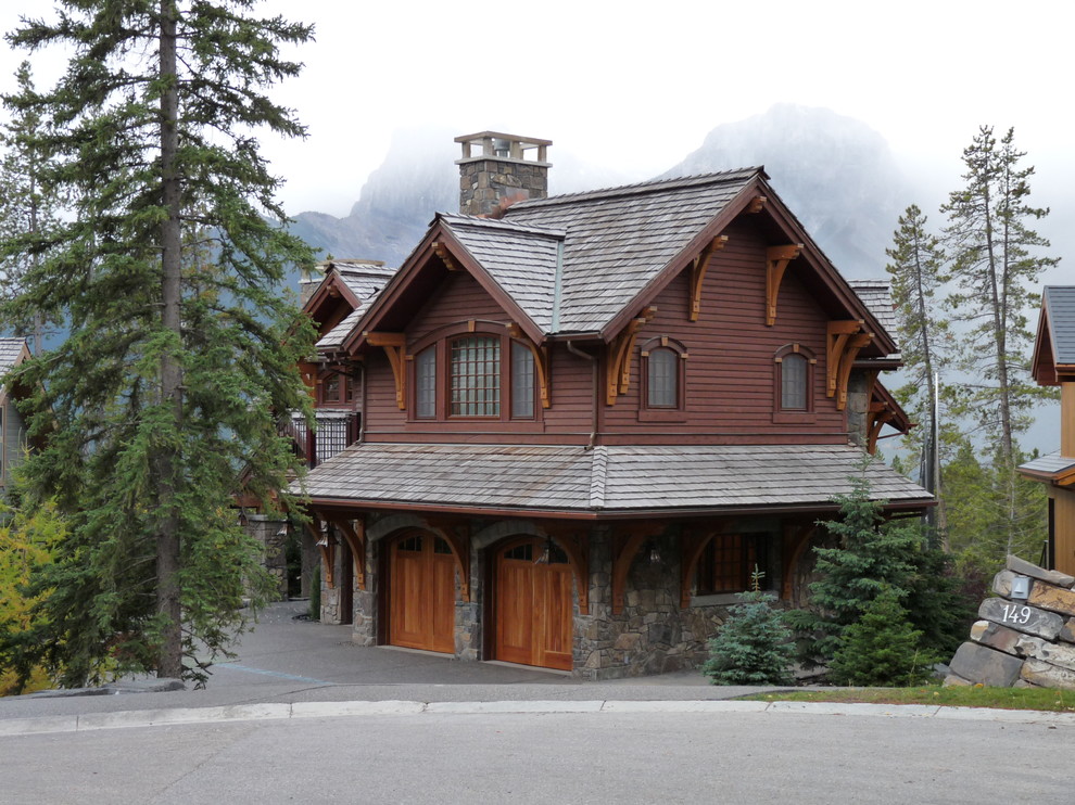 This is an example of a country exterior in Vancouver with wood siding.