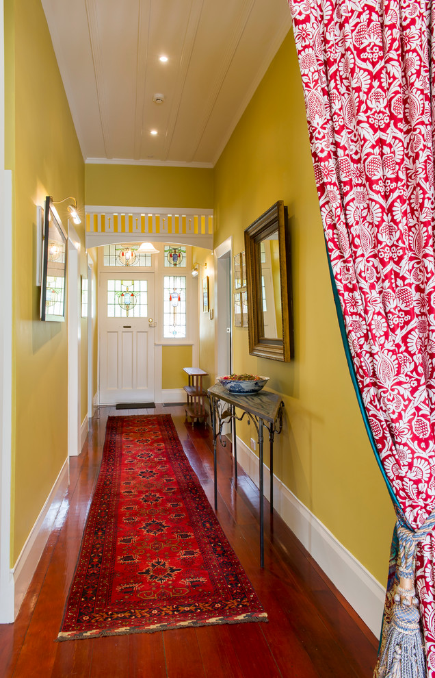 Traditional entryway in Wellington with yellow walls.