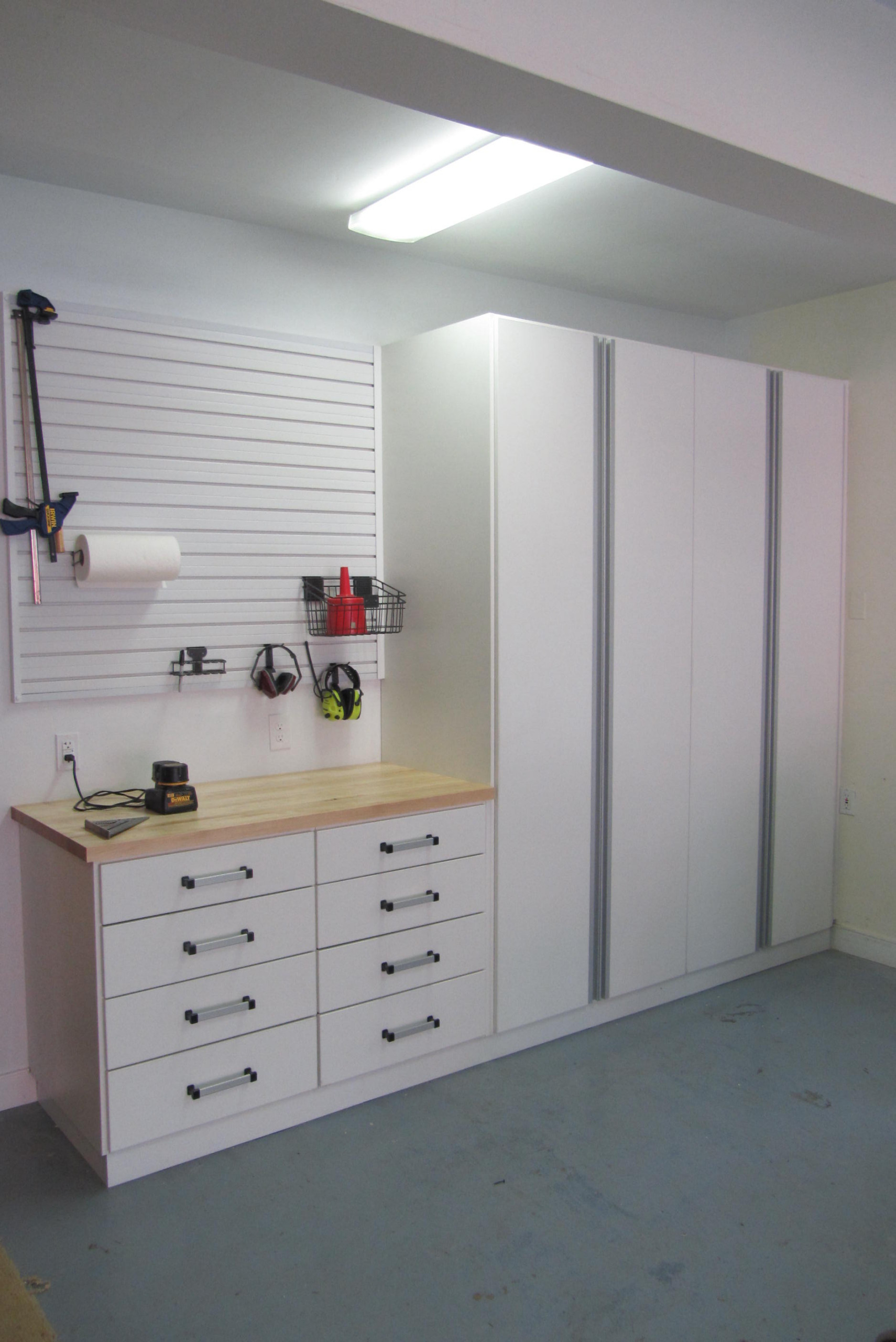 Garage with White Slat Wall & Extruded Aluminum Accents
