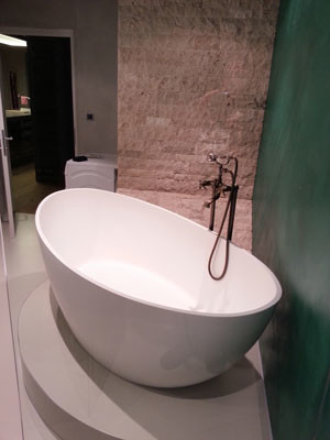 Photo of a mid-sized modern master bathroom in San Francisco with a freestanding tub.
