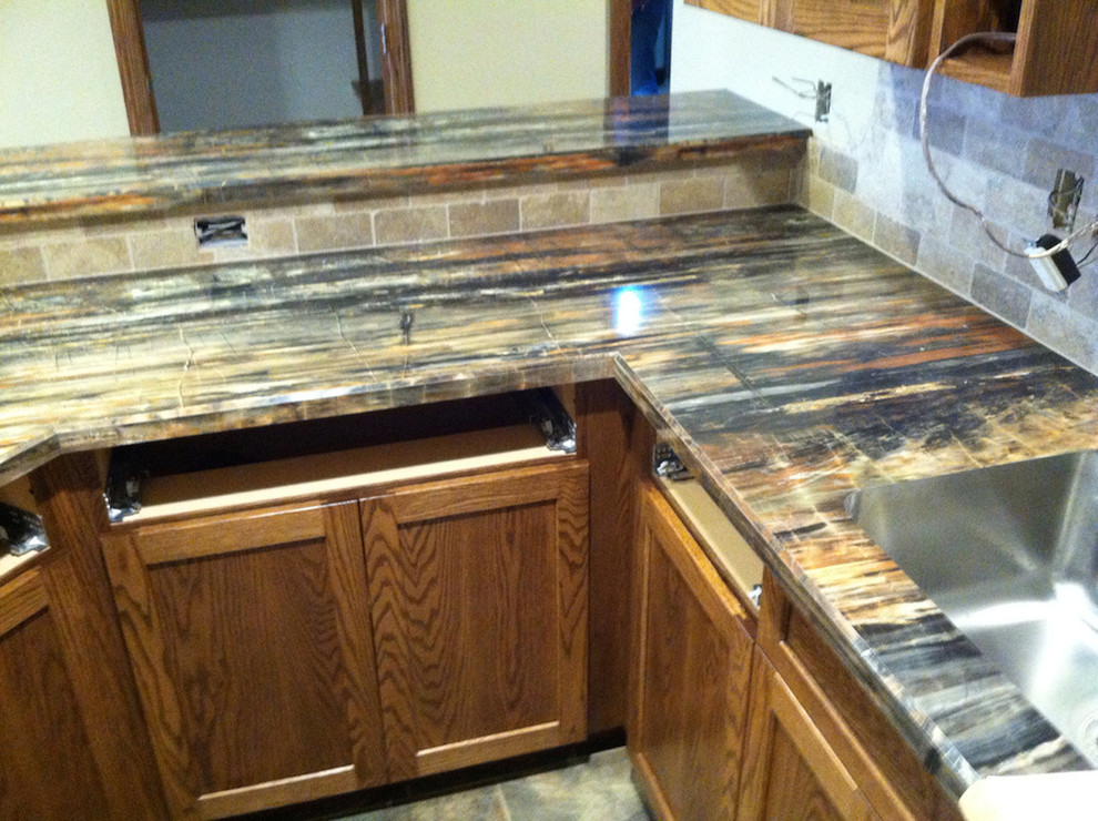 Kitchen - contemporary kitchen idea with recessed-panel cabinets and medium tone wood cabinets