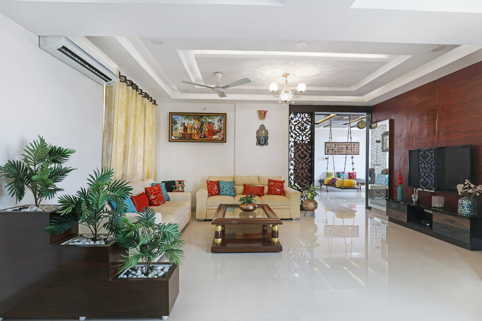This is an example of an arts and crafts living room in Hyderabad.