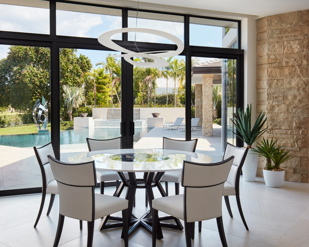Design ideas for a contemporary open plan dining in Miami.