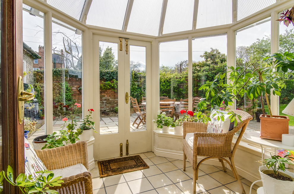 Photo of a small country sunroom in Belfast with no fireplace and a skylight.