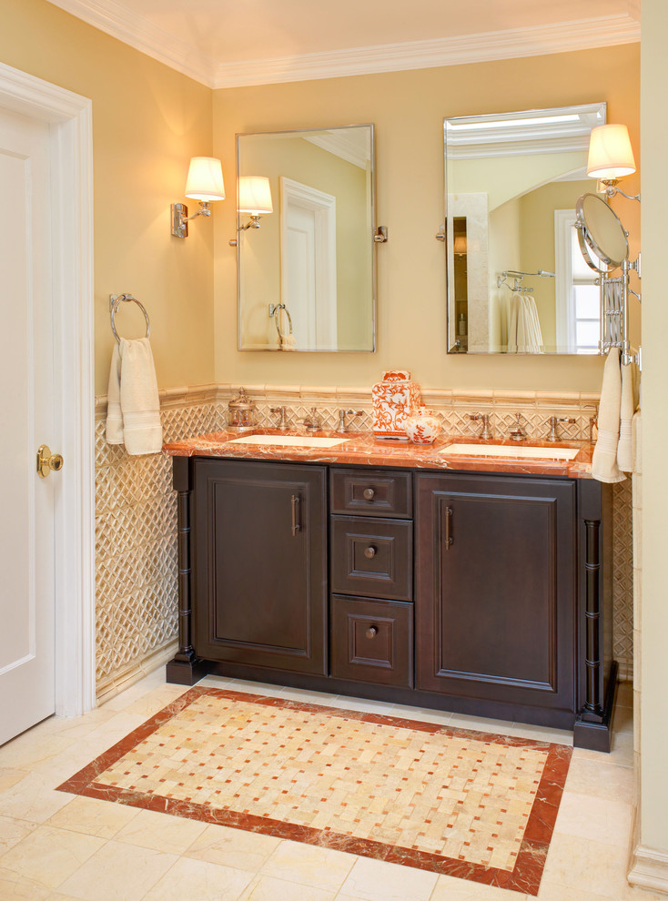 Large traditional master bathroom in San Francisco with a drop-in tub, an alcove shower, a two-piece toilet, stone tile, beige walls, travertine floors and an undermount sink.