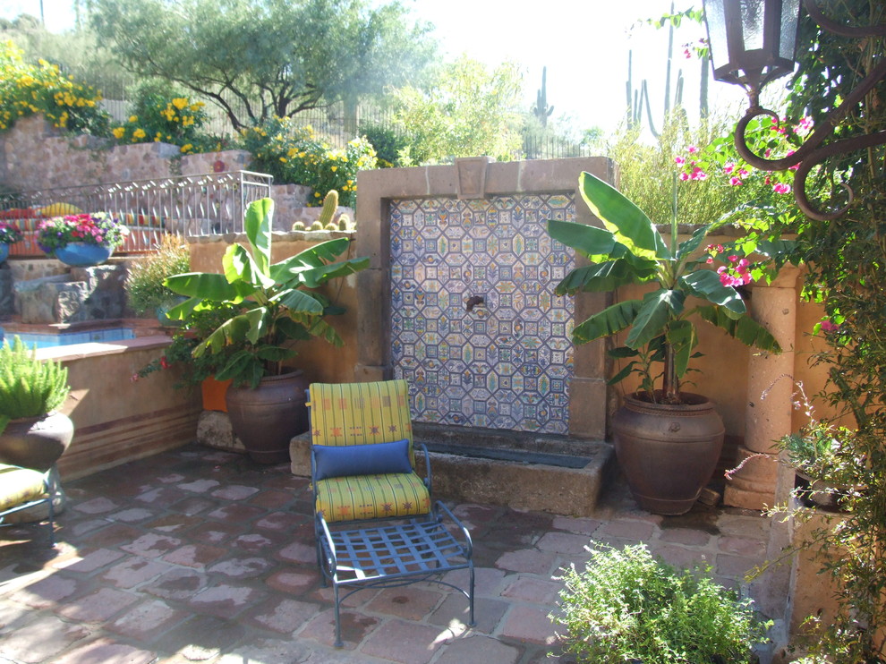 This is an example of a medium sized mediterranean home in Phoenix.