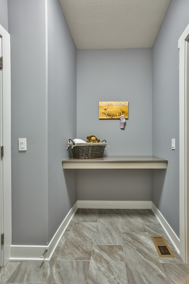 Minimalist laundry room photo in Omaha