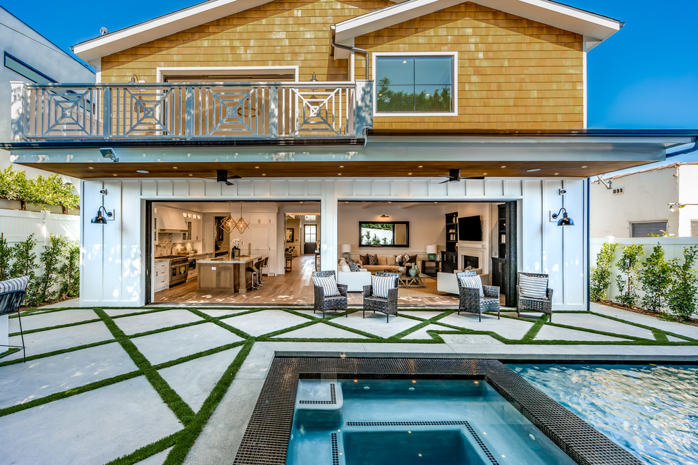 Inspiration for a transitional multicolored two-story mixed siding gable roof remodel in Los Angeles