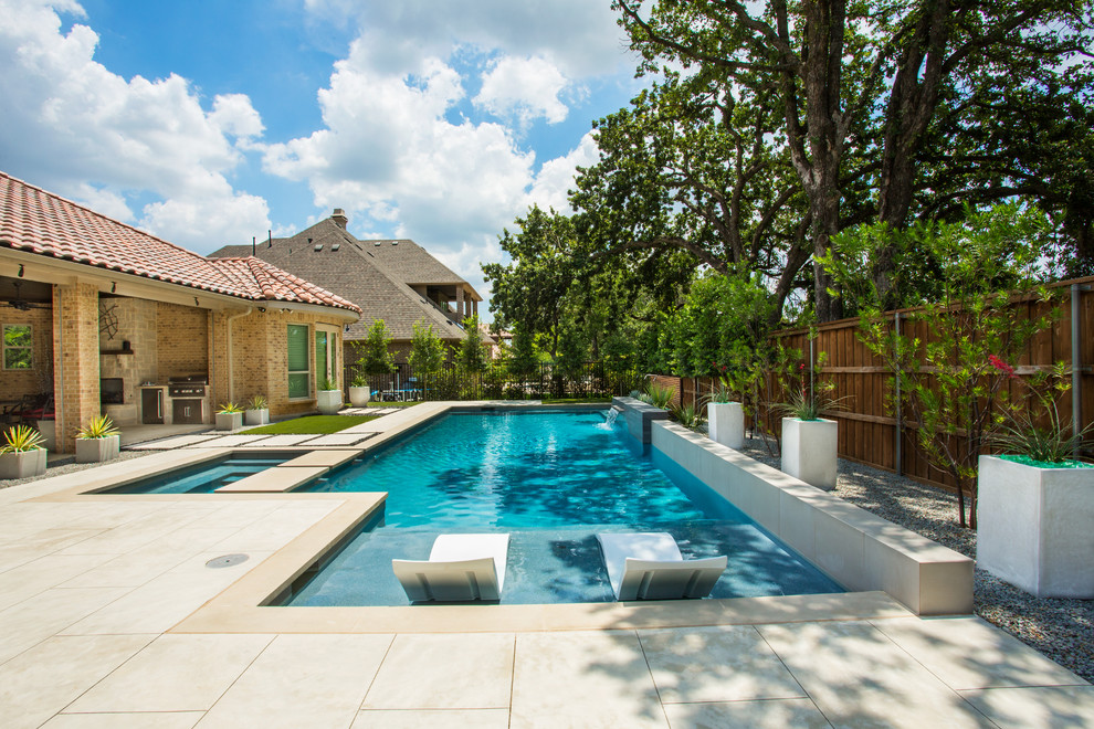 Pool - mid-sized modern pool idea in Dallas