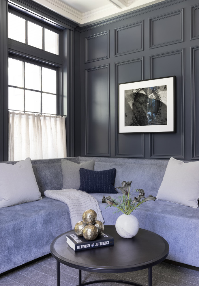 Inspiration for a mid-sized transitional study room in Boston with blue walls, carpet, a built-in desk, grey floor, coffered and panelled walls.