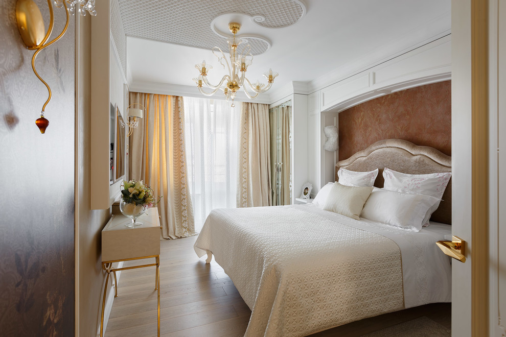 Mid-sized transitional master bedroom in Saint Petersburg with beige walls, light hardwood floors and beige floor.