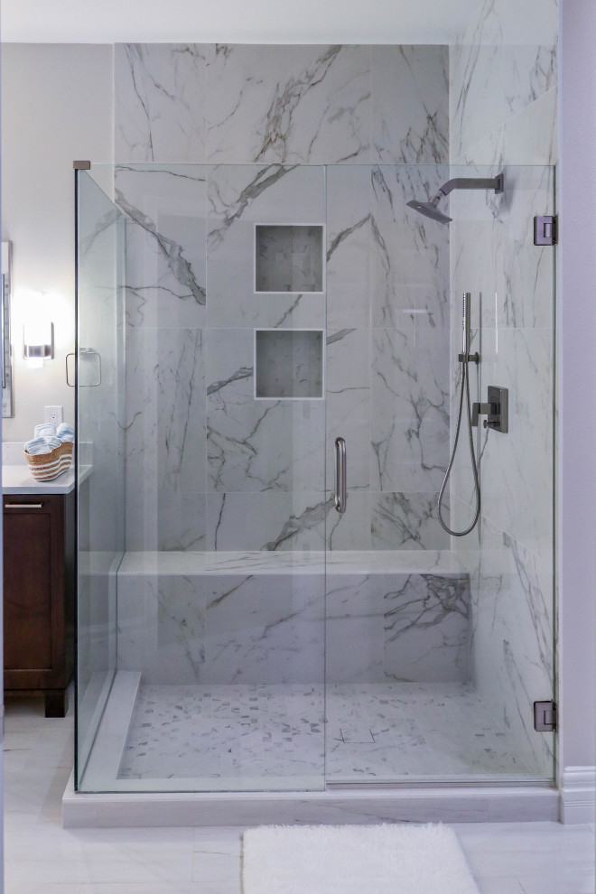 Example of a trendy master white tile and ceramic tile ceramic tile, white floor and double-sink bathroom design in Seattle with furniture-like cabinets, dark wood cabinets, a one-piece toilet, white walls, an undermount sink, marble countertops, a hinged shower door, white countertops and a freestanding vanity