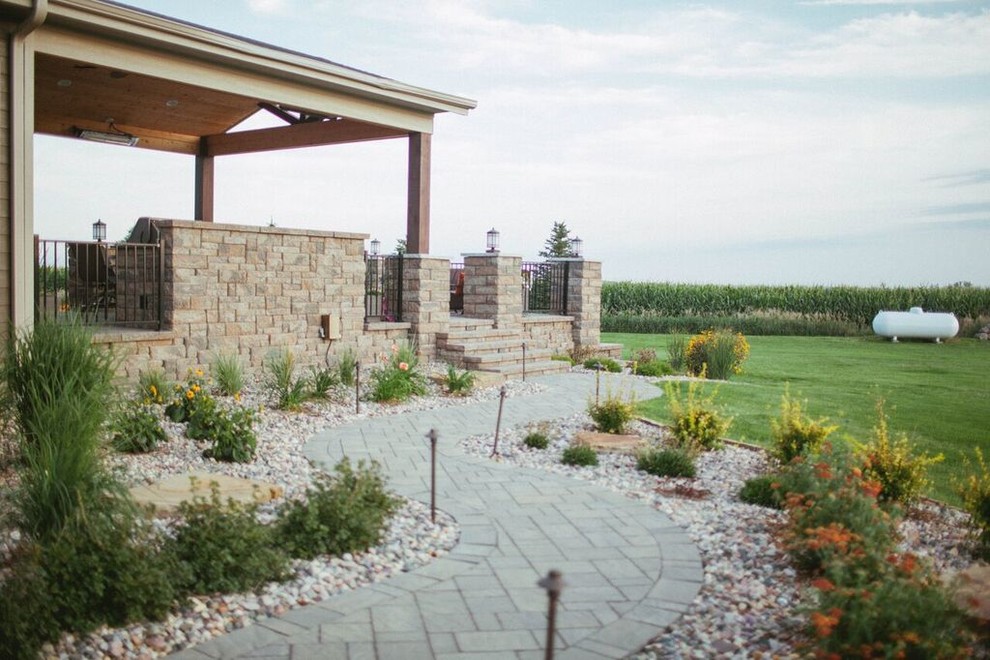 Inspiration for a rustic backyard concrete paver garden path for summer.