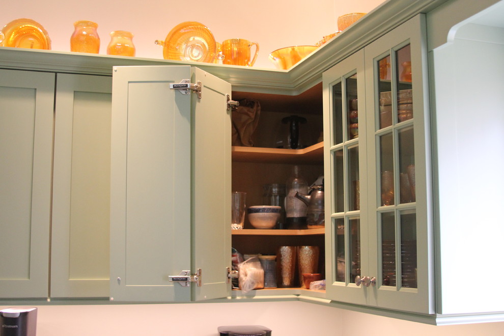 Inspiration for a small transitional l-shaped open concept kitchen remodel in Boston with a farmhouse sink, shaker cabinets, green cabinets, stainless steel appliances and no island
