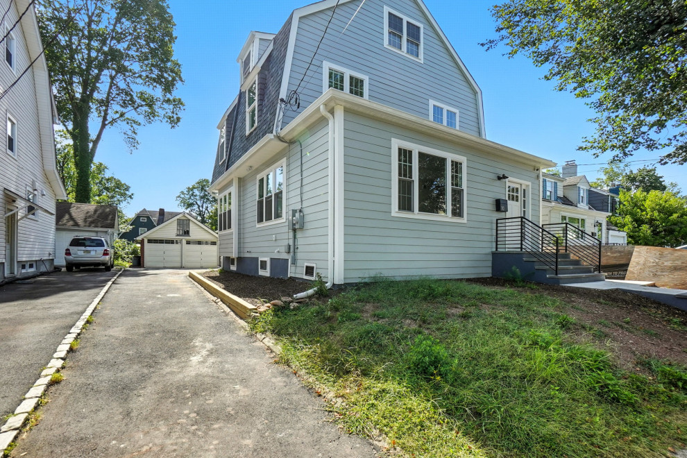 Side Exterior with Dormer and Long Driveway