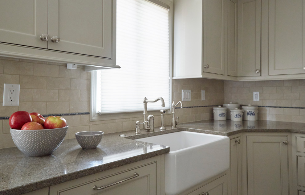 Eat-in kitchen - mid-sized transitional u-shaped ceramic tile and beige floor eat-in kitchen idea in Philadelphia with a farmhouse sink, beaded inset cabinets, beige cabinets, beige backsplash, ceramic backsplash, stainless steel appliances and an island