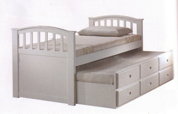 White finish wood Twin bed with pull out trundle bed with storage drawers.