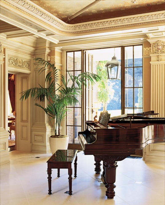 Inspiration for a large mediterranean enclosed living room in Boston with a music area, beige walls and ceramic floors.
