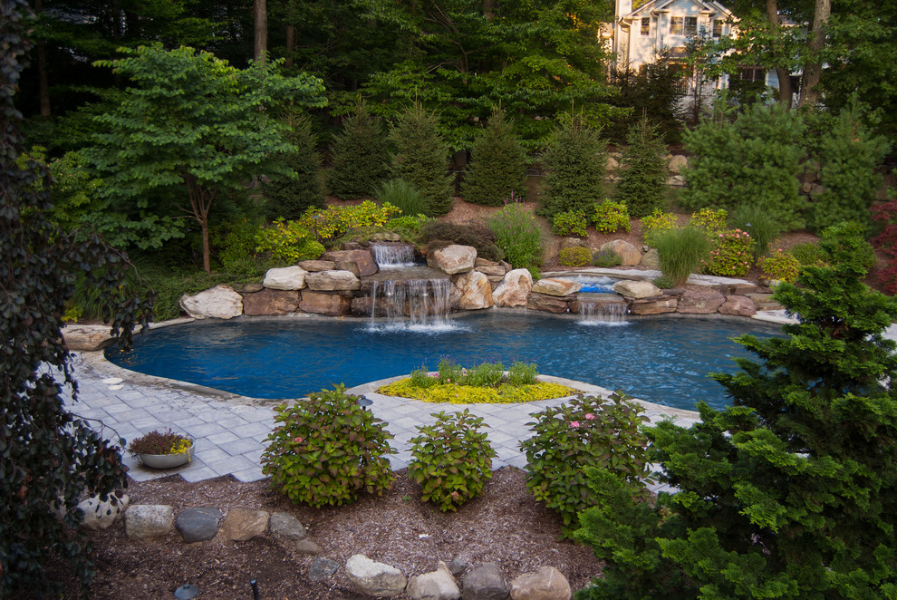 Inspiration for a traditional custom-shaped pool in New York.