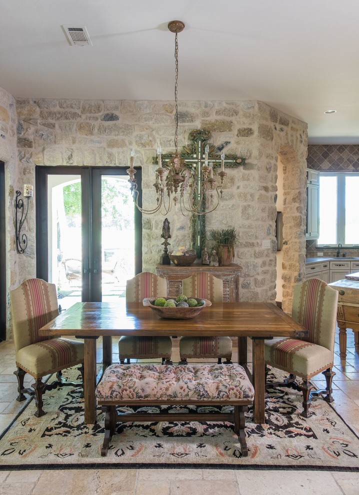 Photo of a large mediterranean dining room in Houston with ceramic floors.