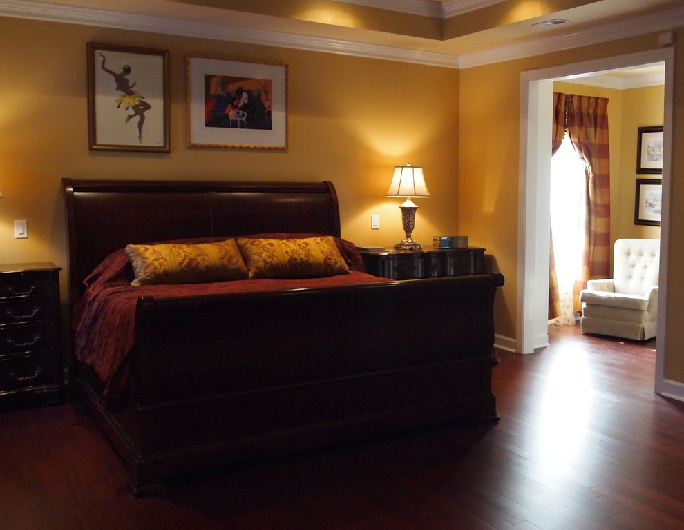 Bedroom - large transitional master dark wood floor bedroom idea with yellow walls and no fireplace