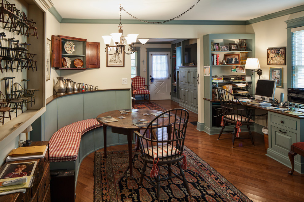 Photo of a country dining room in Cincinnati with medium hardwood floors and white walls.