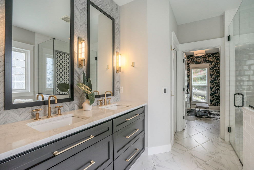 Inspiration for a transitional bathroom in Grand Rapids with shaker cabinets, grey cabinets, an alcove shower, white tile, subway tile, grey walls, an undermount sink, white floor, a hinged shower door, white benchtops and a double vanity.