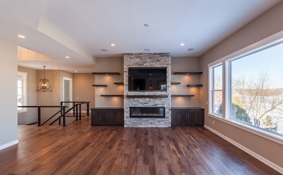 This is an example of a transitional family room in Minneapolis.