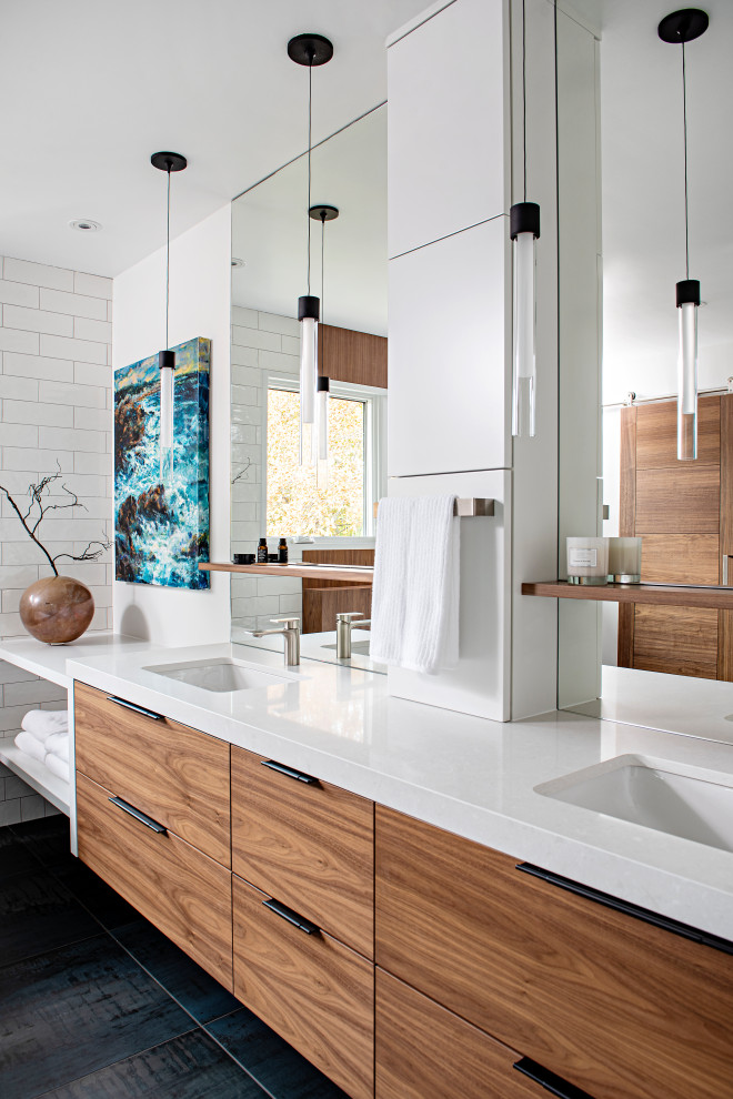 Example of a large trendy master white tile and ceramic tile double-sink bathroom design in Toronto with flat-panel cabinets, medium tone wood cabinets, an undermount sink, quartz countertops, white countertops, a niche and a floating vanity