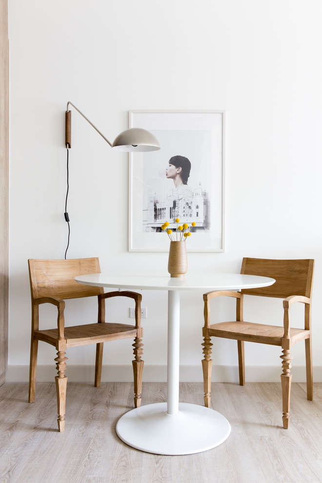 Small danish light wood floor dining room photo in San Francisco with white walls and no fireplace