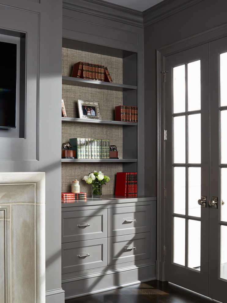 Example of a transitional dark wood floor home design design in Chicago with a standard fireplace and a stone fireplace