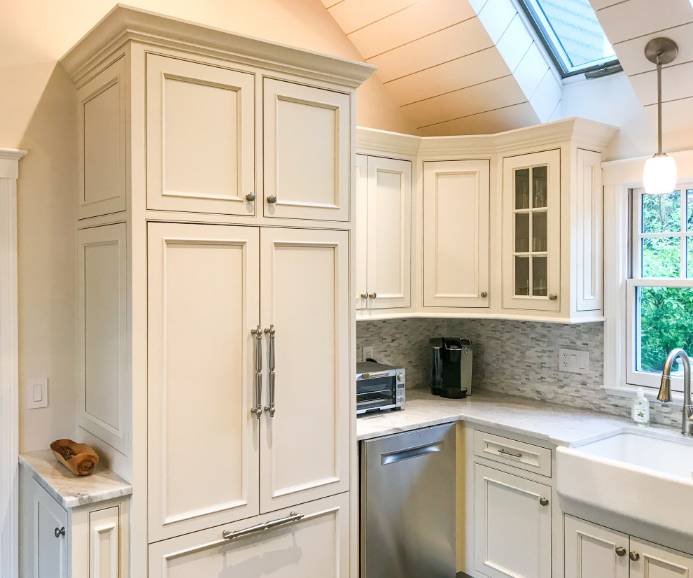 Small transitional u-shaped vaulted ceiling eat-in kitchen photo with beaded inset cabinets, white cabinets, paneled appliances and no island