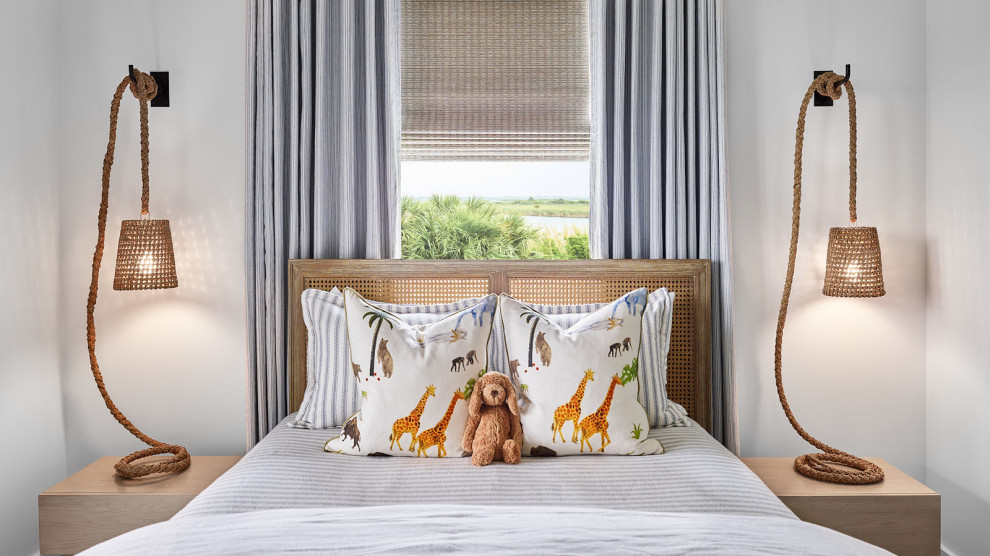 Beach Bungalow - Kids' bedroom - bedroom and small coastal gender-neutral kids' bedroom idea in Houston with white walls