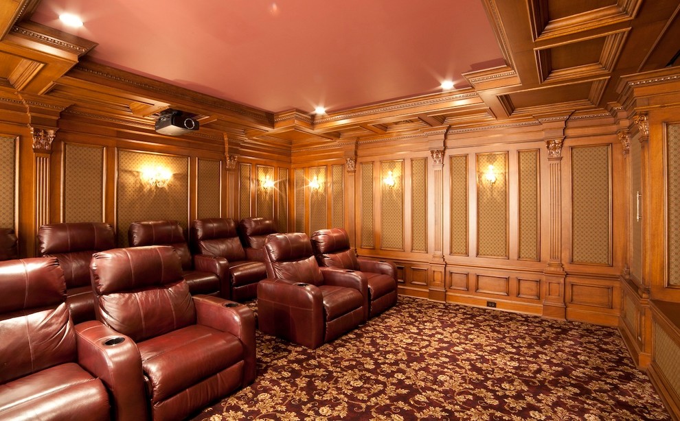 This is an example of a mid-sized traditional enclosed home theatre in New York with a projector screen, yellow walls, carpet and multi-coloured floor.