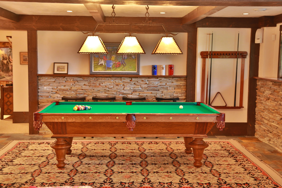 Basement - mid-sized rustic underground slate floor basement idea with beige walls and no fireplace