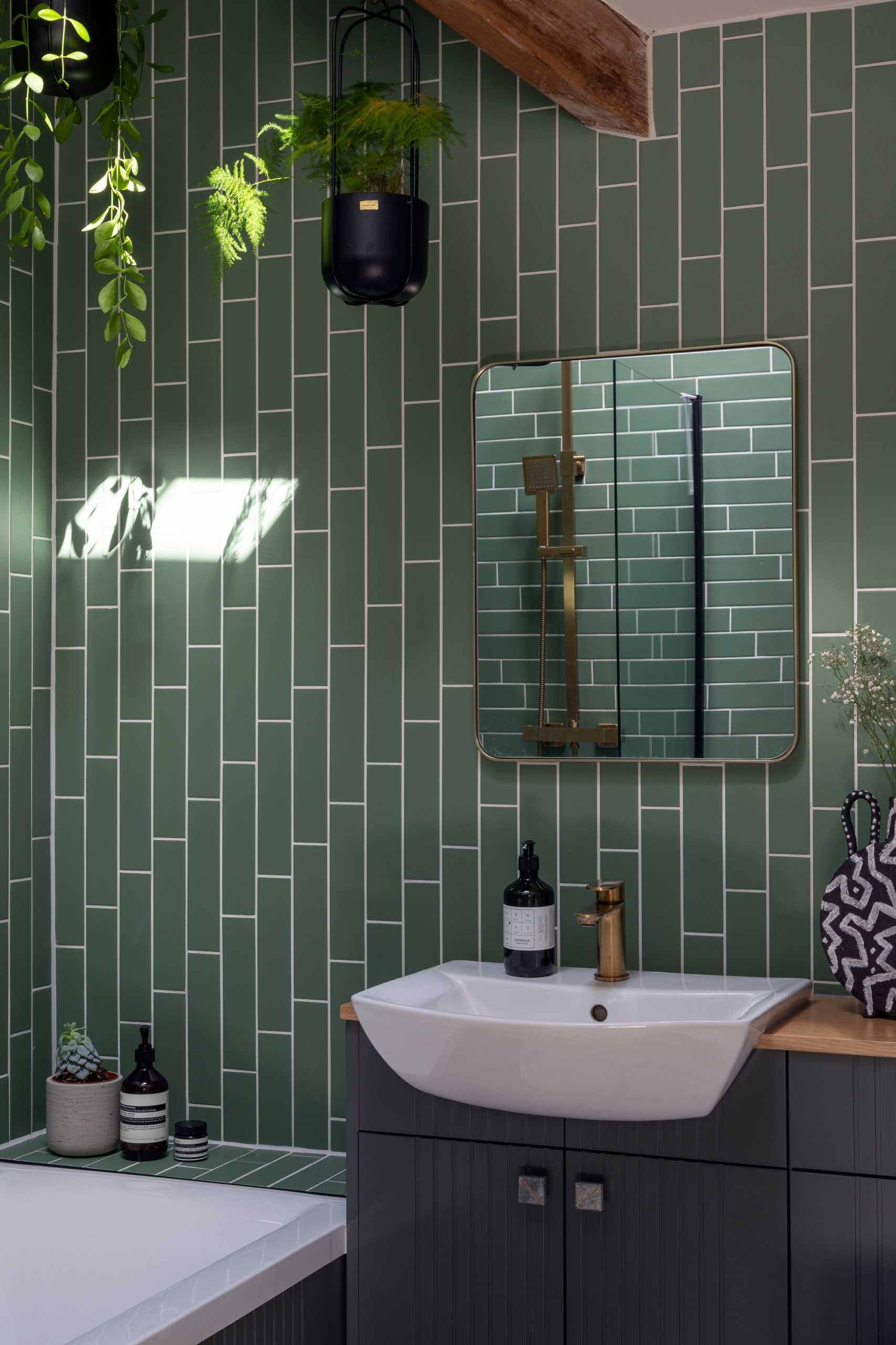 Bathroom - green tile ceramic tile bathroom idea in Other with flat-panel cabinets, gray cabinets, a drop-in sink and a built-in vanity